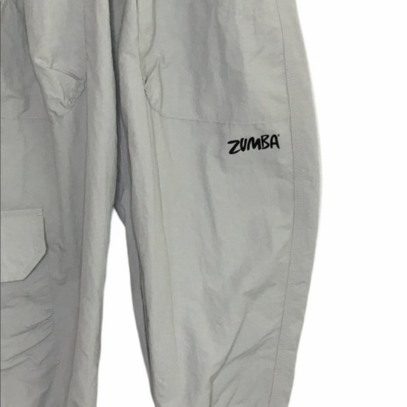 🔴10/$25 Zumba Wear Ultimate Orbit Capri NWT - Picture 3 of 6